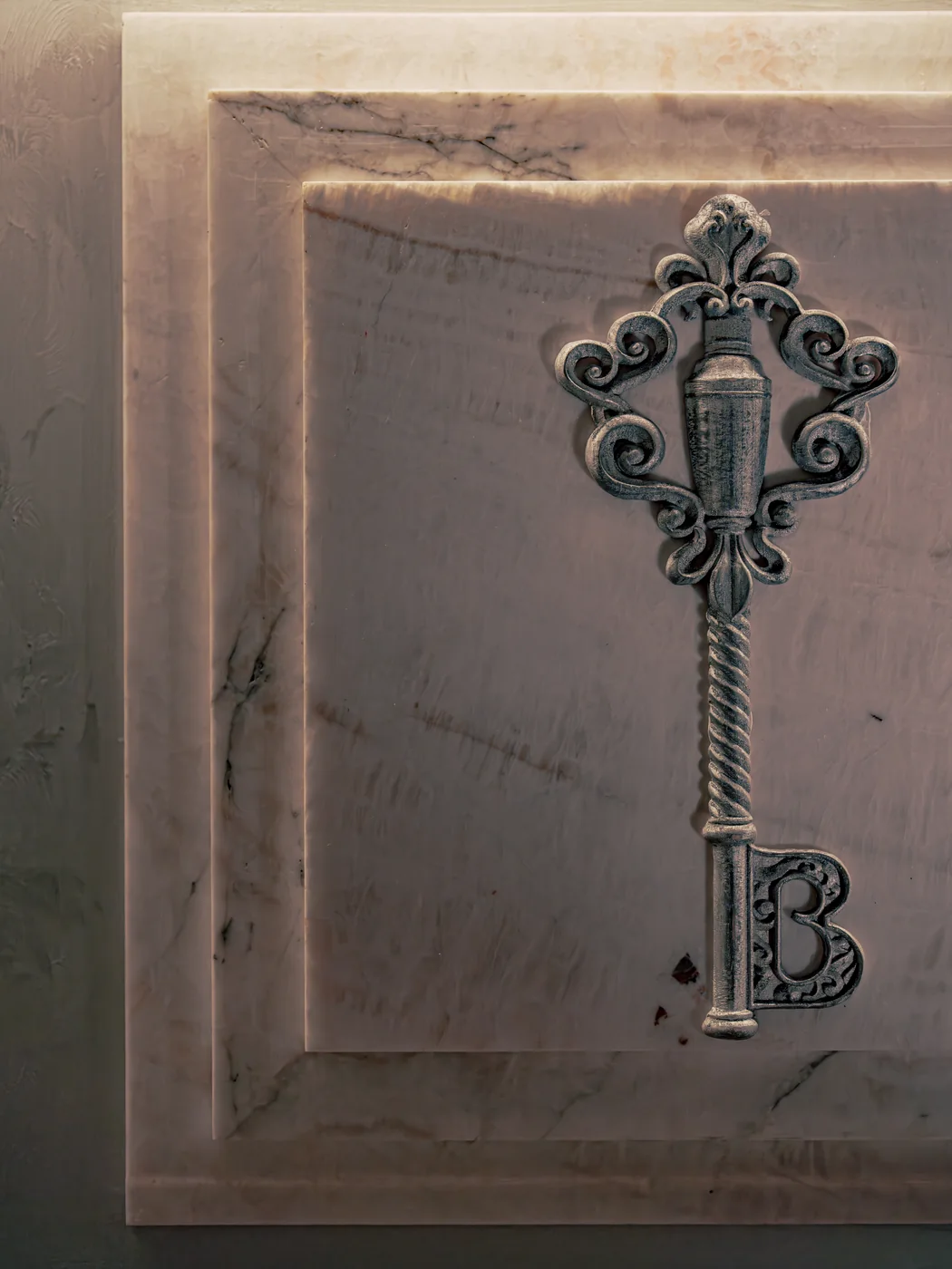 The Barules Cocktail Club key emblem